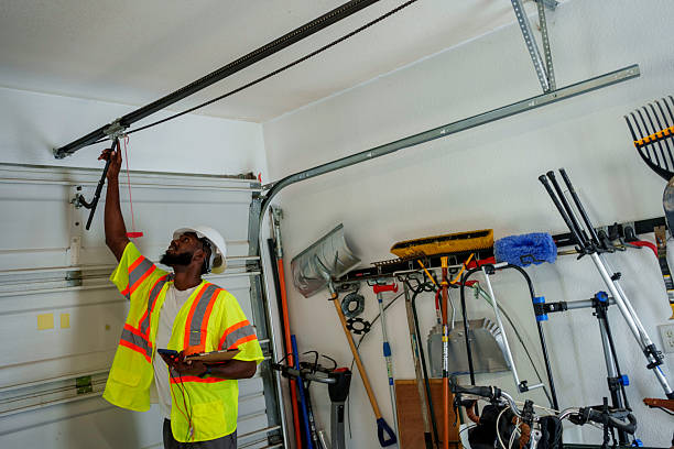 Professional Garage Door Panel Replacement technician working in Logan County County, ND